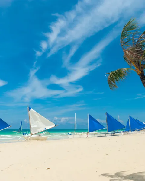 Paraw sailboats on White Beach, Boracay