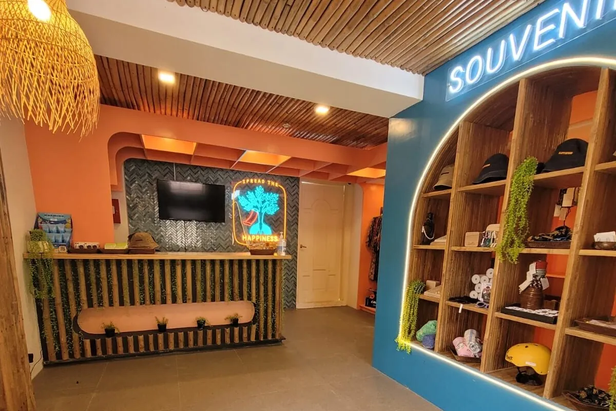 The Happiness Shop with souvenirs on wooden shelves