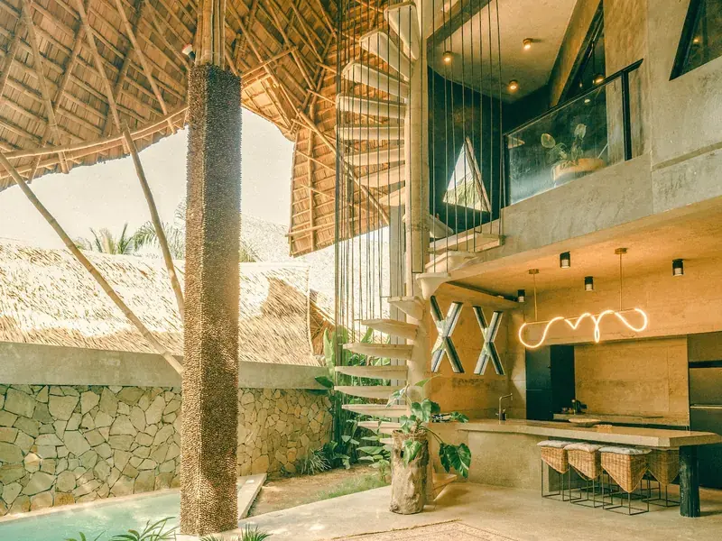 The thatched roof and garden of the Kulambo Villa